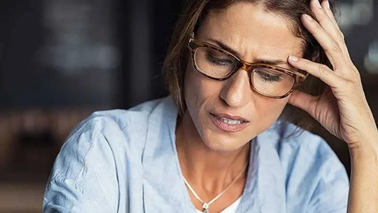 Stressed woman who didn't use a travel agent