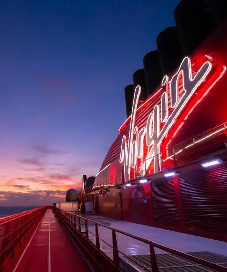 Virgin-Superbowl - Best Travel Agents in NJ - JJ Travel Associates Virgin cruise at night for the Superbowl at Sea