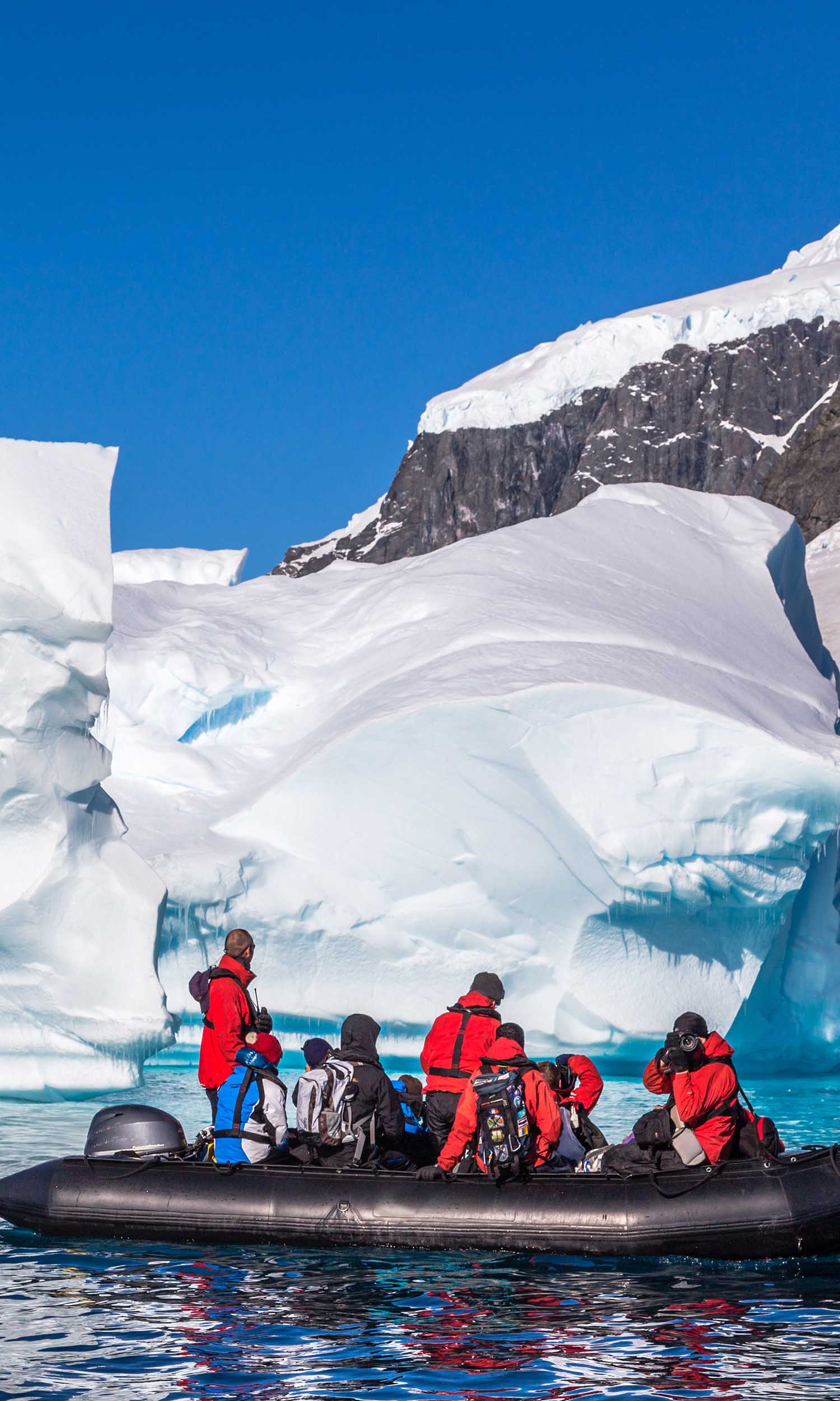People on expedition in a zodiak