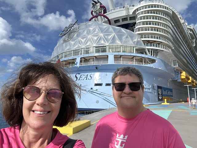 Jen and Joel in front of Utopia of the Seas