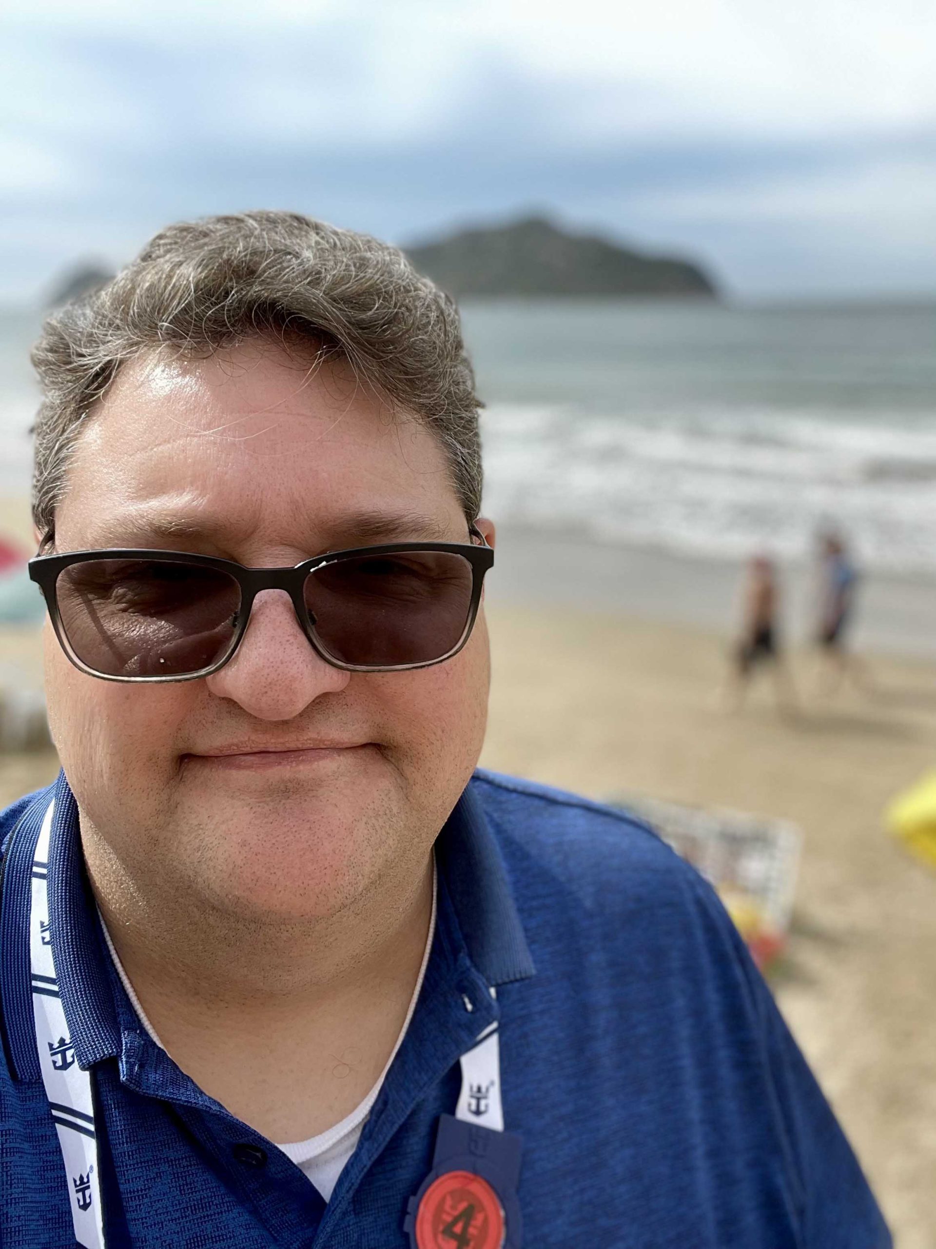 Joel with a cruise ship in the background