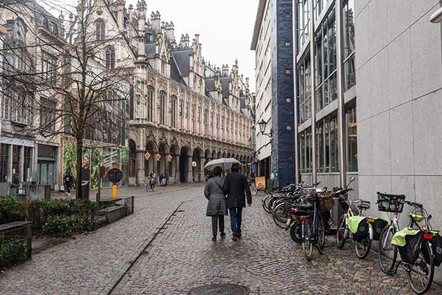 Couple walking in the rain in Europe