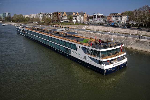 Avalon Envision docked in the heart of a city